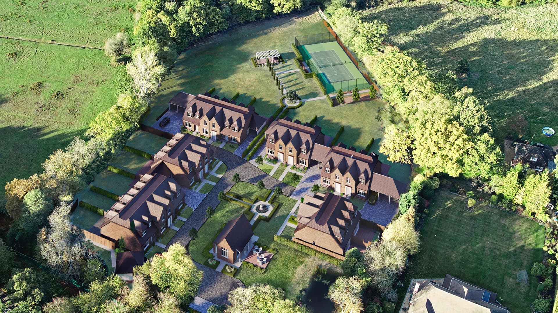 Aerial view of a courtyard development set within mature trees